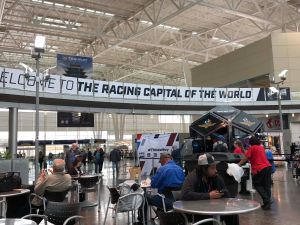 Atrium at Indianapolis International Airport, with "The Racing Capital of the World" banner