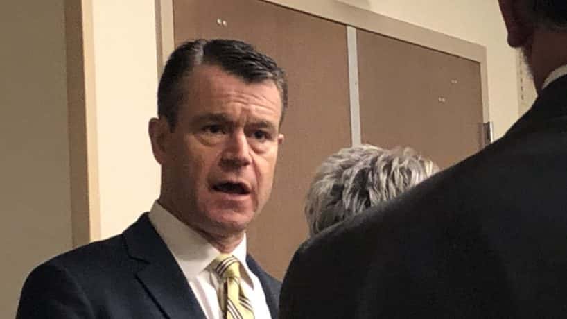 A photo of Todd Young speaking at an event in Indiana