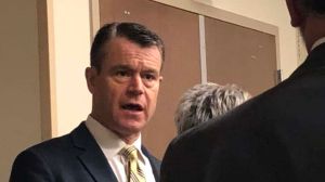 A photo of Todd Young speaking at an event in Indiana