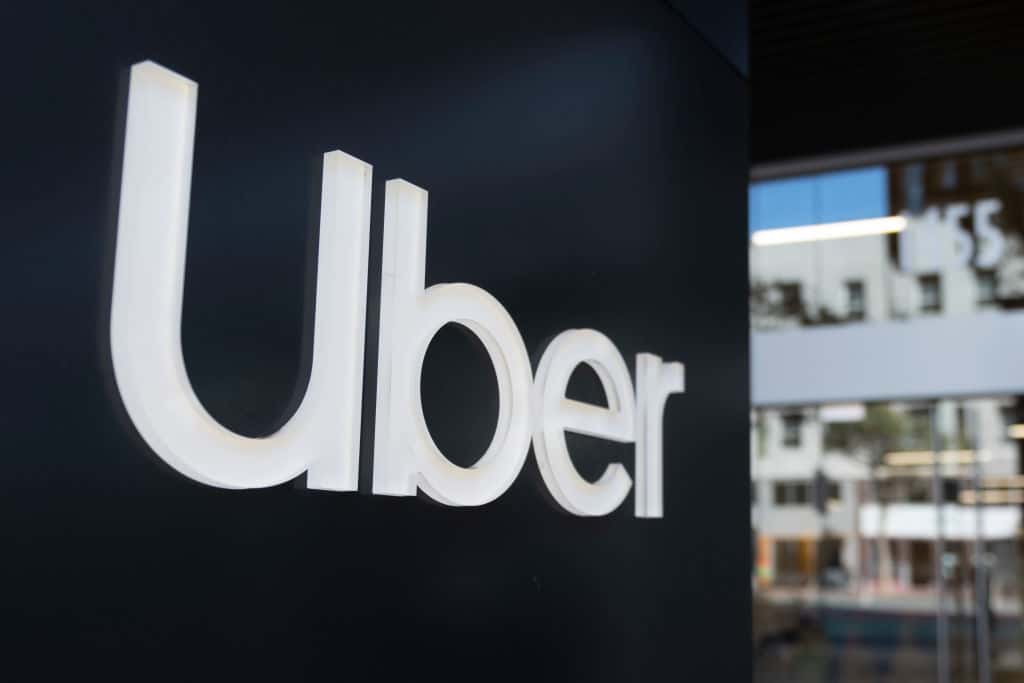Uber logo is seen at its headquarters in San Francisco, California on October 15, 2019. The ridesharing company has laid off 350 employees on Monday, October 14, in an effort to cut cost. Shares of Uber climbed 3.2% following the announcement. (Photo by Yichuan Cao/NurPhoto via Getty Images)