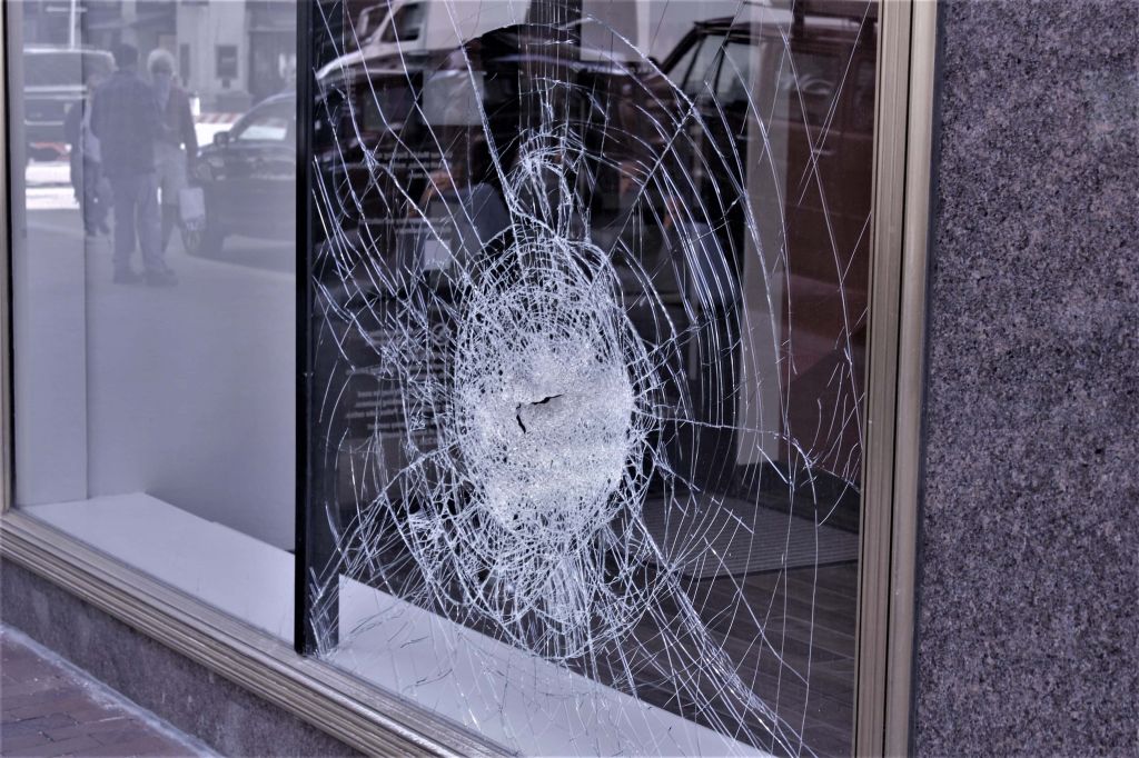 Damage to a window of a downtown business