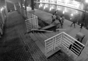 A surveillance photo of a group of people on the downtown Canal Walk.