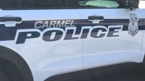 A photo of a Carmel police cruiser at a crime scene