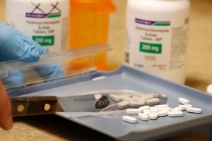 A pharmacy tech counts out pills of Hydroxychloroquine at Rock Canyon Pharmacy in Provo, Utah, on May 20, 2020. - US President Donald Trump announced May 18 he has been taking hydroxychloroquine for almost two weeks as a preventative measure against COVID-19. (Photo by GEORGE FREY / AFP) (Photo by GEORGE FREY/AFP via Getty Images)