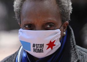 Chicago mayor Lori Lightfoot arrives at Wrigley Field on April 16, 2020 in Chicago Illinois. Wrigley Field has been converted to a temporary satellite food packing and distribution center in cooperation with the Lakeville Food Pantry to support ongoing relief efforts underway in the city as a result of the COVID-19 pandemic. (Photo by Jonathan Daniel/Getty Images)