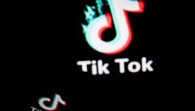 TikTok closeup logo displayed on a smartphone screen and another TikTok logo as background on a TV screen in Chania, Crete Island, Greece on August 3, 2020. President of the USA Donald Trump is threatening and planning to ban the popular video sharing app TikTok from the US because of the security risk. (Photo by Nikolas Kokovlis/NurPhoto via Getty Images)