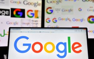 A picture taken on November 20, 2017 shows logos of US multinational technology company Google displayed on computers' screens.