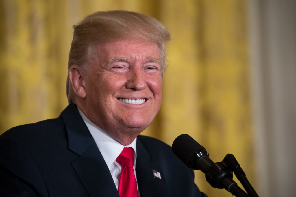 U.S. President Donald Trump laughs during his joint press conference with President Sauli Niinistö of the Republic of Finland, in the East Room of the White House, on Monday, August 28, 2017. (Photo by Cheriss May/NurPhoto via Getty Images)