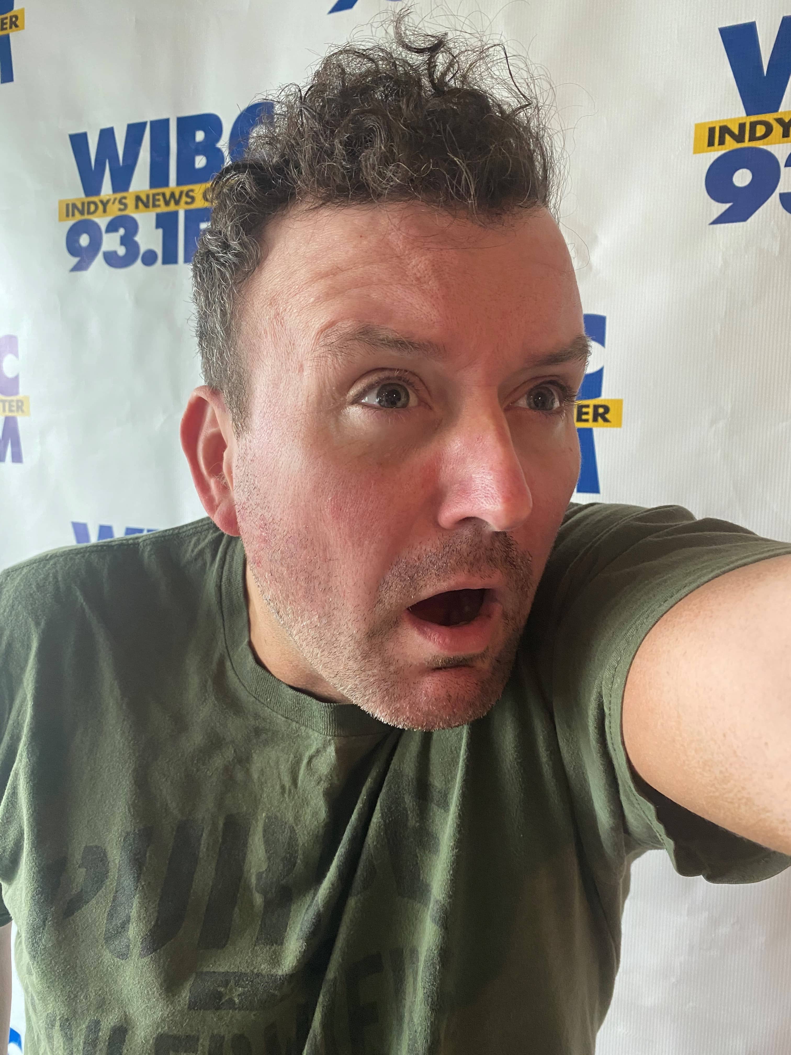 Matt bair with a blank look on his face as if he sees something shocking