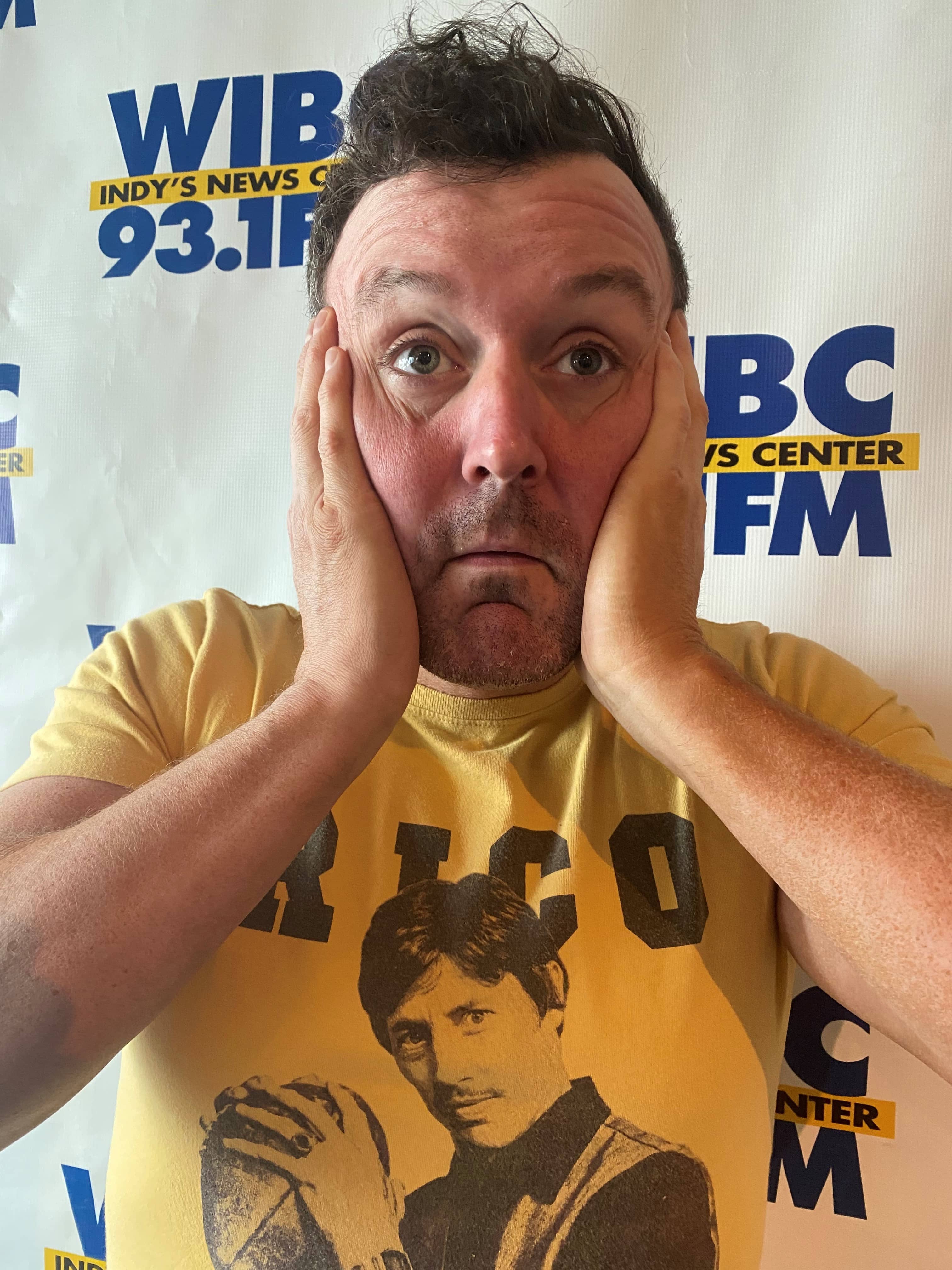 Matt Bairs with his hands on his cheek as if he is worried or shocked