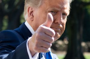 Donald Trump looking at camera and giving a thumb's up