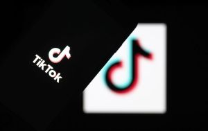 In this illustration photo logo of TikTok is displayed on a smartphone and a pc screen in Ankara, Turkey on May 11, 2021. (Photo by Rasit Aydogan/Anadolu Agency via Getty Images)