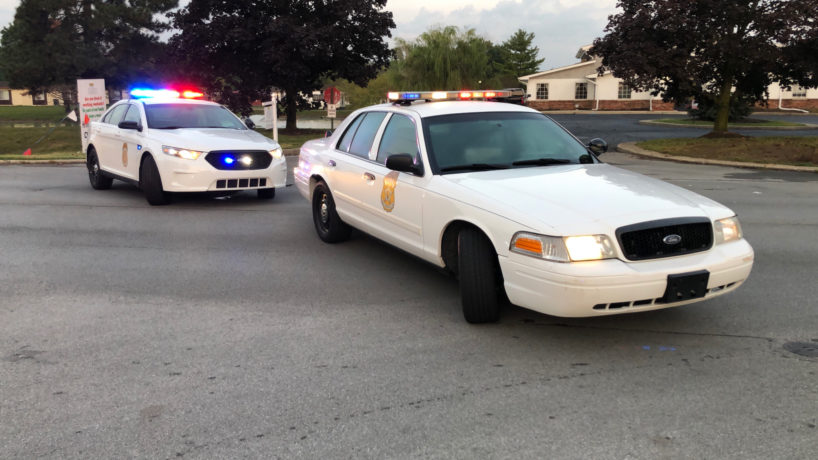 Two IMPD police cars at the scene of a hit-and-run involving a 13-year-old girl.