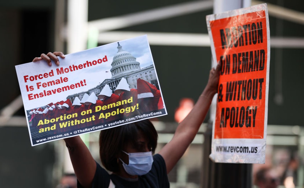 A group of people are gathered at the Times Square of New York City, United States on September 4, 2021 to protest that a Texas law banned abortion. (Photo by Tayfun Coskun/Anadolu Agency via Getty Images)