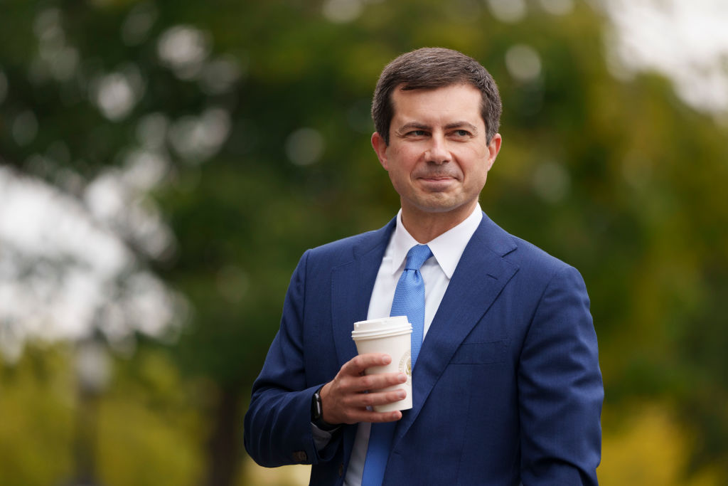 U.S. Transportation Secretary Pete Buttigieg arrives for a television interview with CNBC outside the White House October 13, 2021 in Washington, DC. With the holiday season approaching, President Biden is expected to announce that the Port of Los Angeles will begin to operate 24 hours a day in efforts to relieve the backlog in the supply chain that delivers goods to the United States. Americans have seen delays in a host of consumer goods, including electronics, cars, lumber, toys and more. (Photo by Drew Angerer/Getty Images)