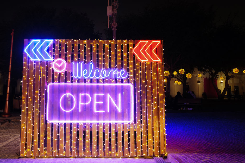 Welcome Open sign at the Tasty Street at the Katara Cultural Village in Doha, Qatar.