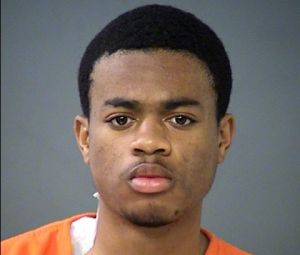 Deonta Williams in an orange jail jumpsuit