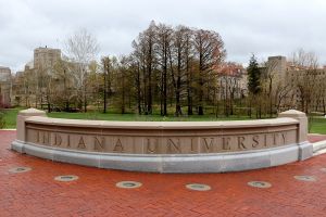 Photograph of the Indiana University sign located on the campus of Indiana University Bloomington.