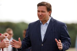 Florida governor Ron DeSantis meets with fans during Day One of The Walker Cup at Seminole Golf Club on May 08, 2021 in Juno Beach, Florida. (Photo by Cliff Hawkins/Getty Images)