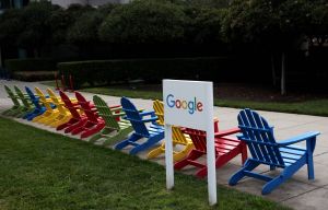 A sign is posted in front of a building on the Google campus