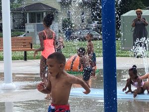 Kids playing on the splashpad in Arsenal Park on Indy's near eastside