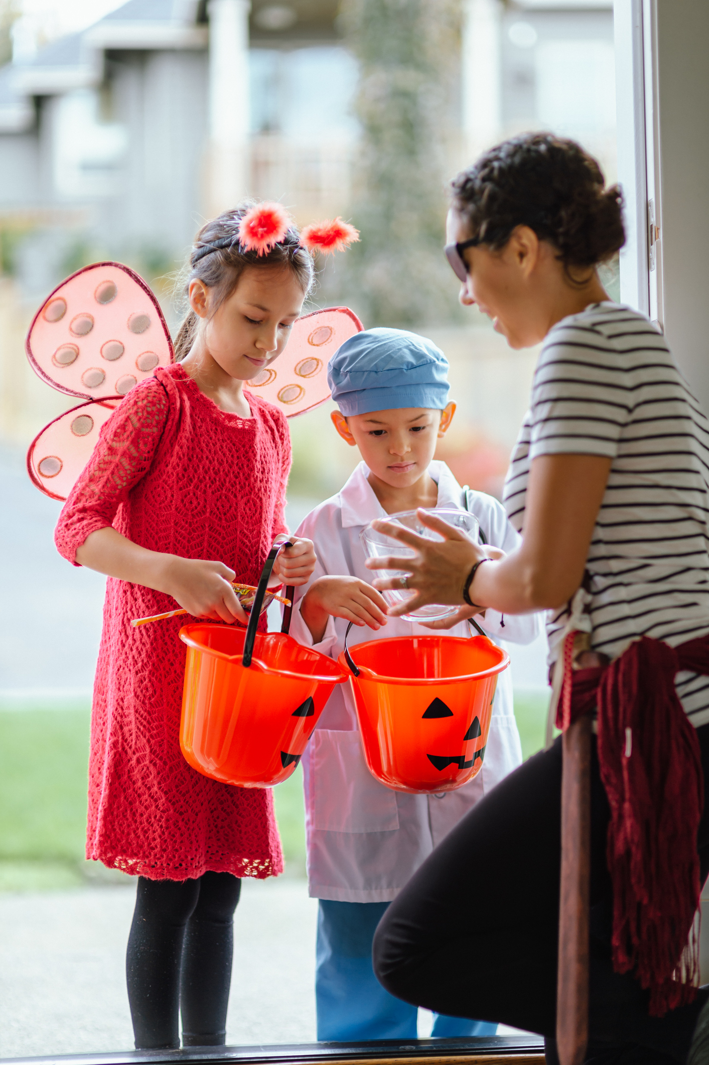 Adorable children trick or treating