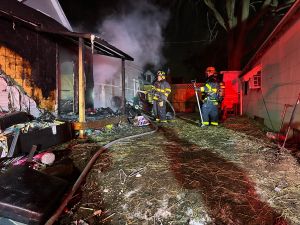 Image of Columbus Firefighters fighting a residential fire on Hutchins Avenue.