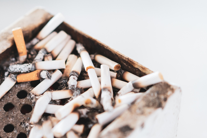 Pile of remaining cigarette butts in ashtray