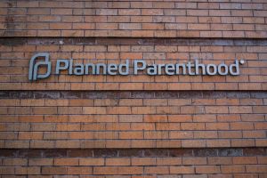 Bill Tompkins Planned Parenthood signage Archive