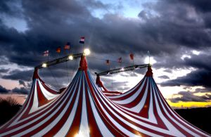 Circus big top at dusk.