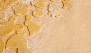 Raw Easter cookies on baking paper close-up