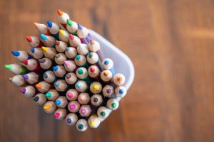 Collection of Coloring pencils in a cup container