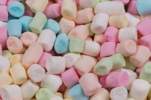 Colorful marshmallows as background, macro. Fluffy marshmallows texture close up.