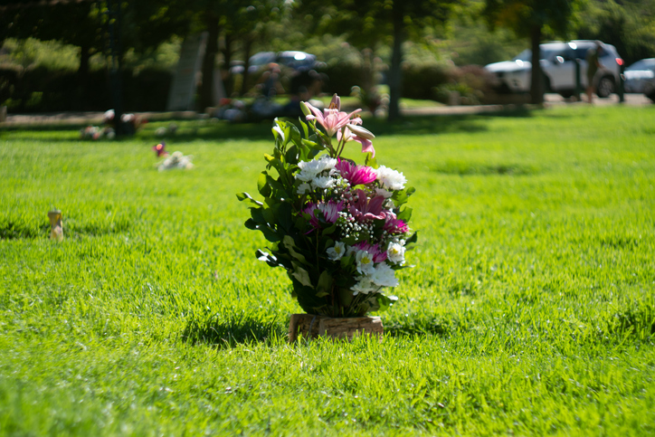 Visit to the cemetery with bouquets of flowers