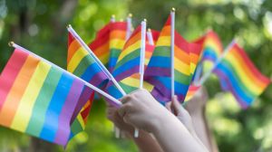 LGBT pride or LGBTQ+ gay pride with rainbow flag for lesbian, gay, bisexual, queer and transgender people human rights social equality movements in June month