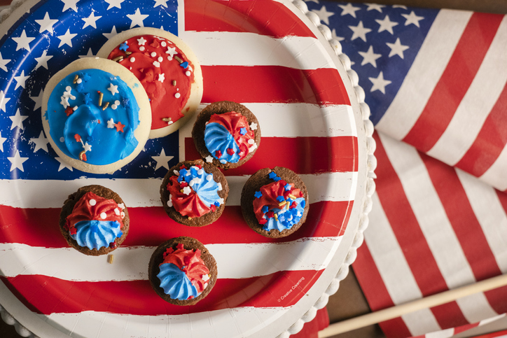 Patriotic cookies on the American flag plate for the 4th of July stock photo.