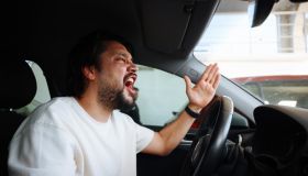 Young man getting angry on the road