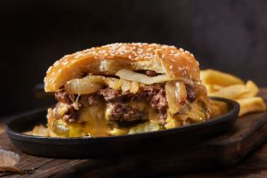The Juicy Lucy Stuffed Cheeseburger with Fried Onions