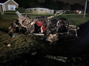 Mangled car from fatal crash after police chase