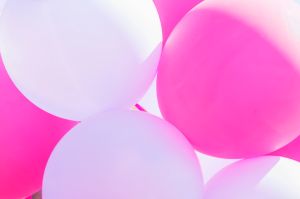 Pink balloon in sunlight for background use