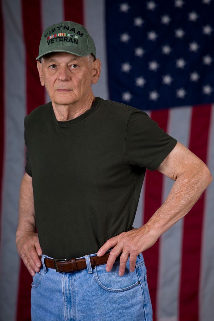 Vietnam Veteran standing hands on hips