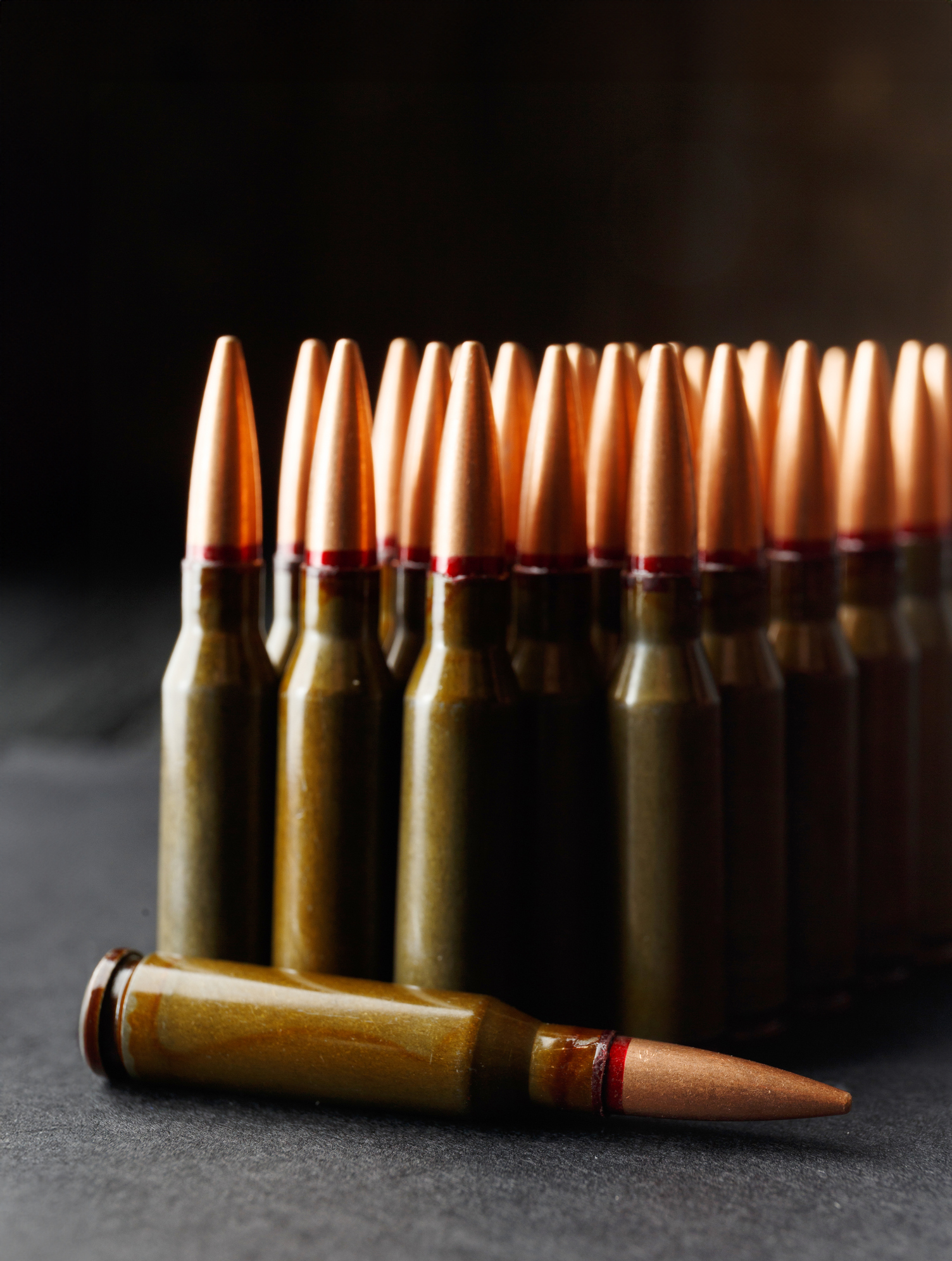 Bullets, ammunition on a dark background, close-up