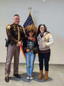 Aneres Bellefont Posing with Her Award