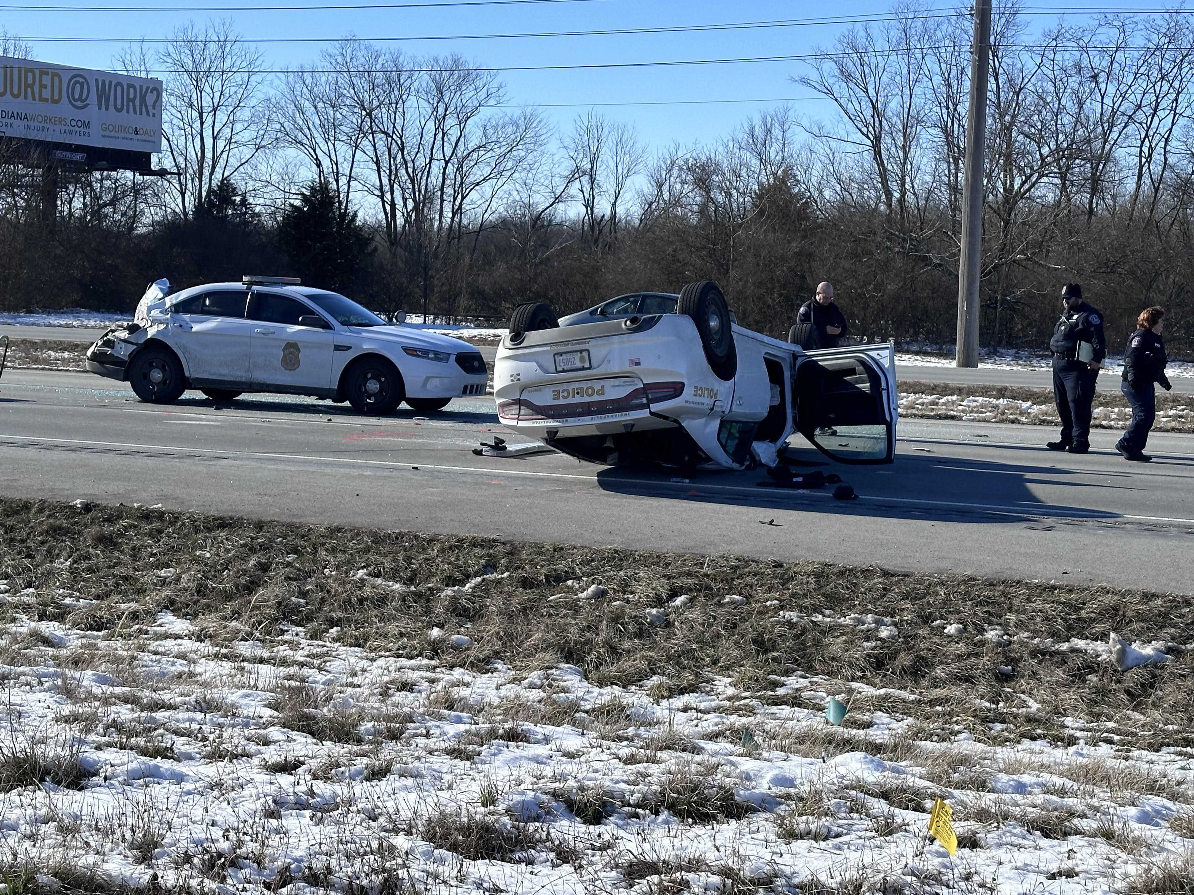 A Police Officer Was Seriously Hurt When The Car That He Was Driving