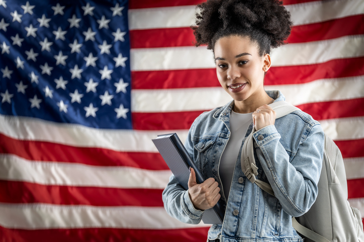 Students wave your American flags