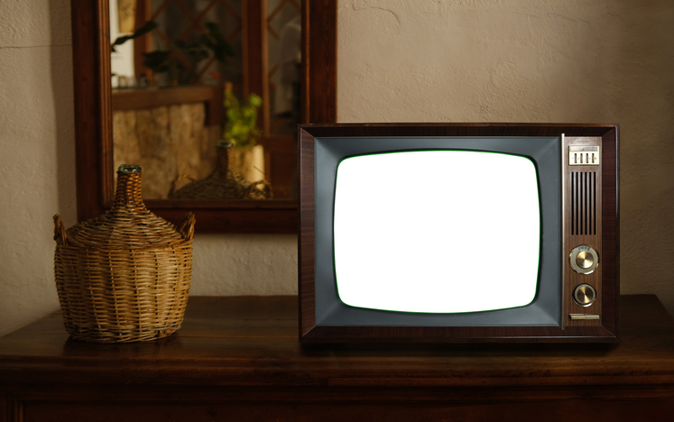 footage of Dated TV Set with white Screen Mock Up Chroma Key Template Display, Nostalgic living room with furniture and old mirror, retro style Television, selective focus, vintage evening tv concept