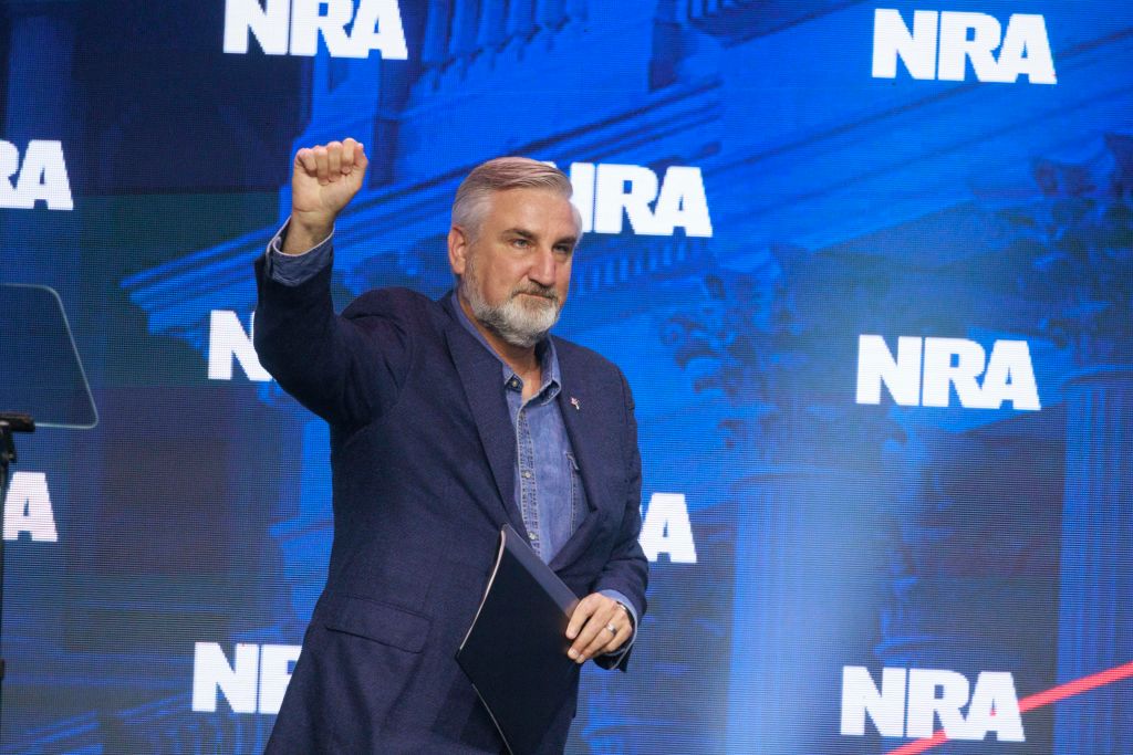 Indiana Governor Eric Holcomb speaks to guests at the 2023...