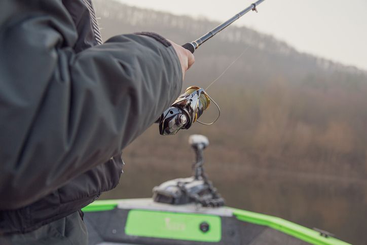 Fishing on the lake at sunse.spinning fishing.