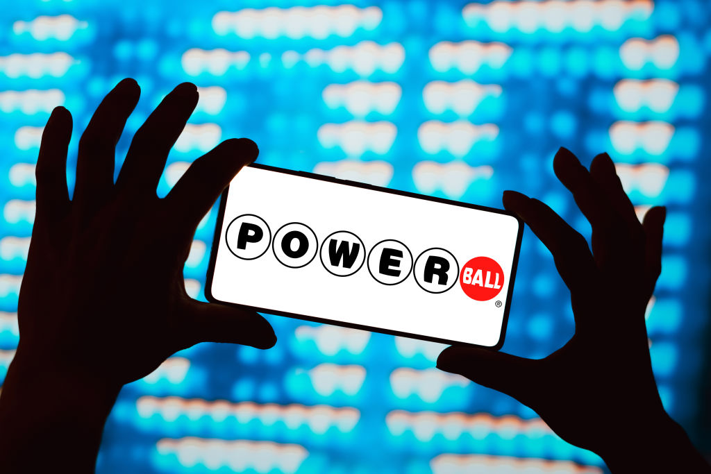 In this photo illustration, the Powerball logo is displayed...