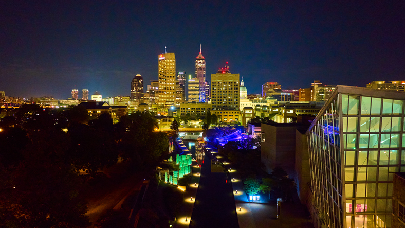 Aerial Indianapolis Night Cityscape with Illuminated Skyscrapers and River